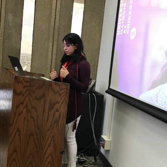 Student stands at podium